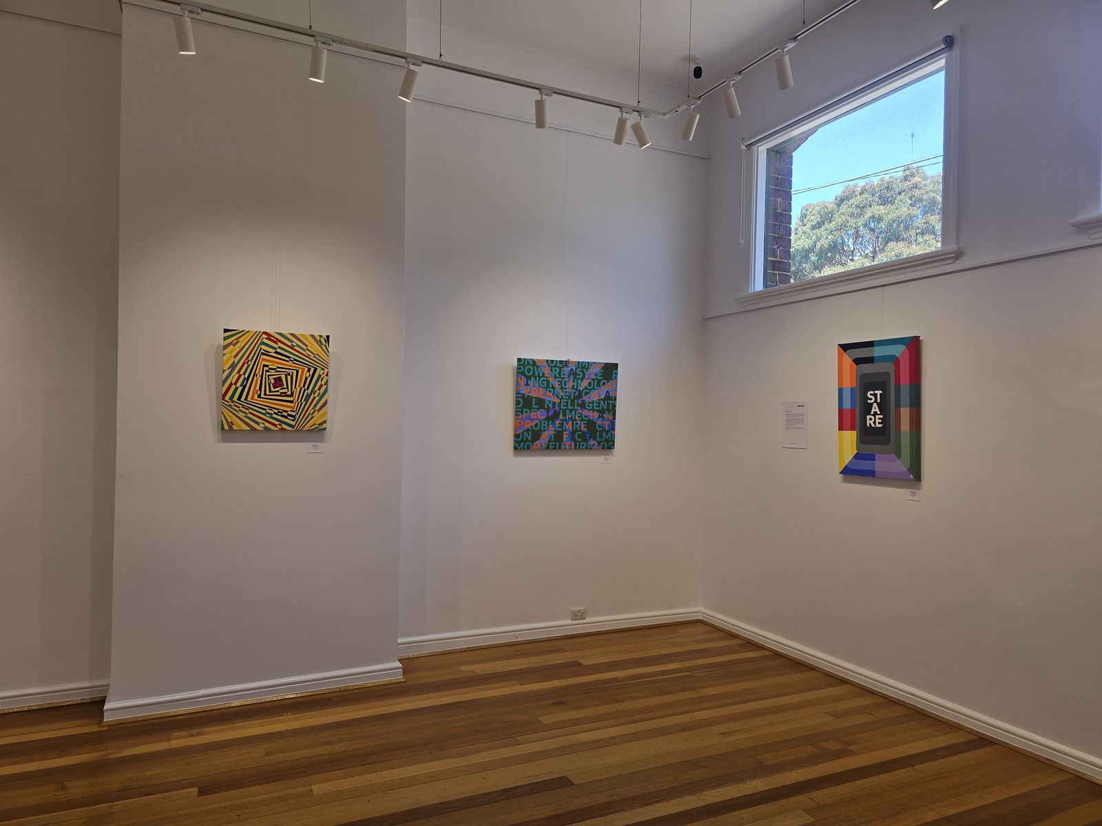 Hidden Myths — acrylic paintings installed at Gasworks gallery, wide view